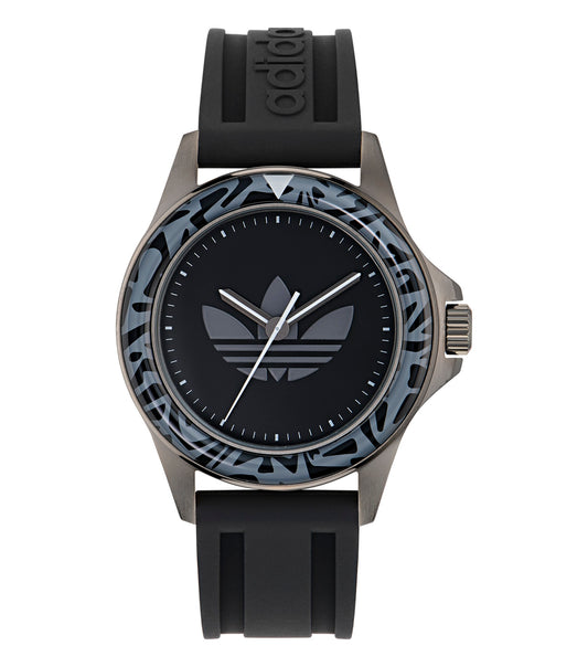Adidas analog watch in white, side-view angle showcasing sleek minimalist design with clear dial and bold Adidas branding.