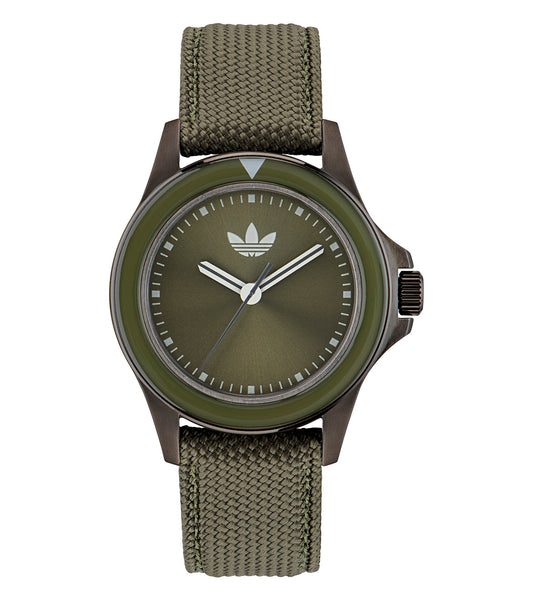 Adidas quartz watch in side angle, showcasing a sleek design with a black strap and a clear, minimalist face displaying time.