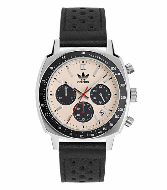 Adidas watch in vibrant blue with classic stainless steel bezel, side angle view showcasing its sleek design and elegance.