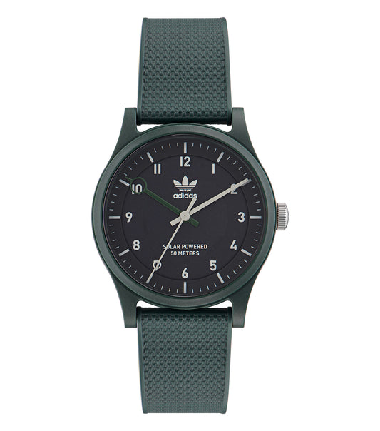 Adidas watch in a subtle color, flatlay view showcasing its minimalist round dial, sleek strap, embodying style and function.