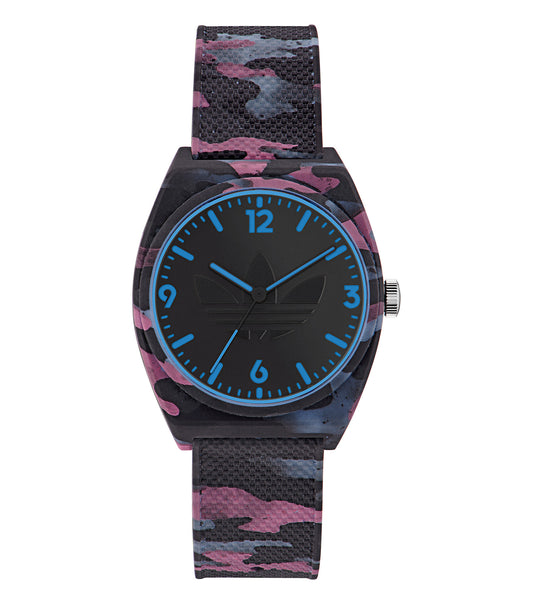 Adidas Quartz color watch with minimalist design, front angle view, black and white face, and sporty silicone strap.