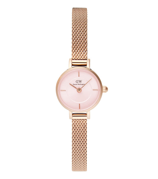 Daniel Wellington's Blush RG watch at a 19-degree angle with a rose gold mesh strap, minimalist black face, and subtle logo.