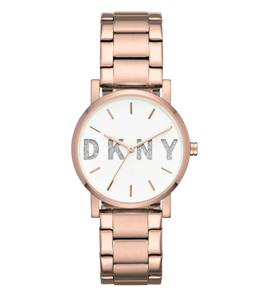 DKNY Quartz Watch in elegant beige color, captured from a 34-degree angle, showcasing sleek minimalist design and modern elegance.