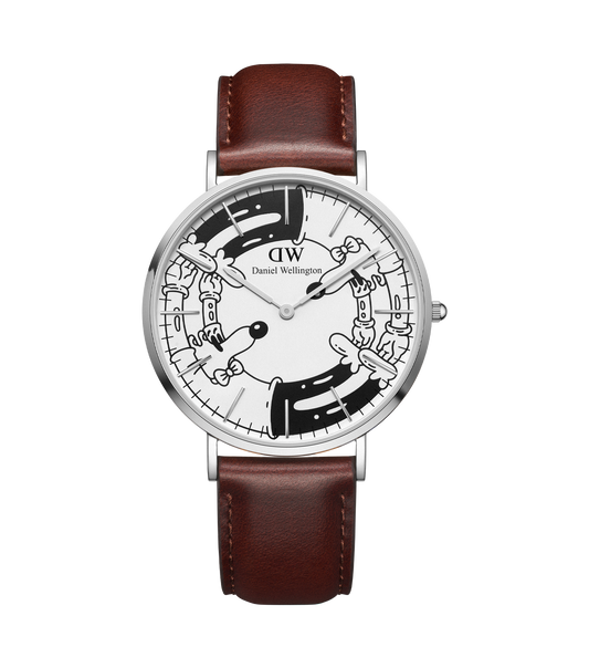 Daniel Wellington watch in subtle tone, showcasing elegant design at a side angle with a simple dial and classic strap.