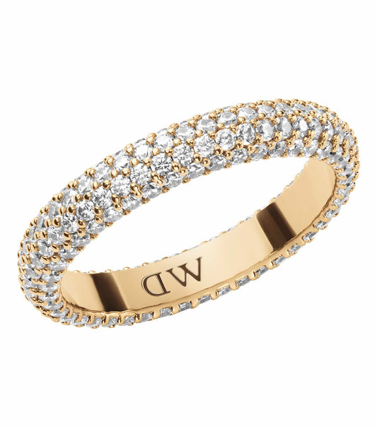 Rose gold Daniel Wellington ring, featuring a sparkling pavé design, elegantly displayed at a slightly tilted angle.