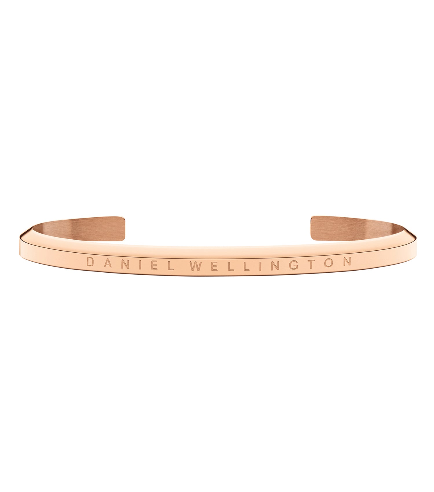 Elegant Daniel Wellington rose gold bracelet cuff, angled on a white backdrop, showcasing sleek minimalistic design and timeless charm.