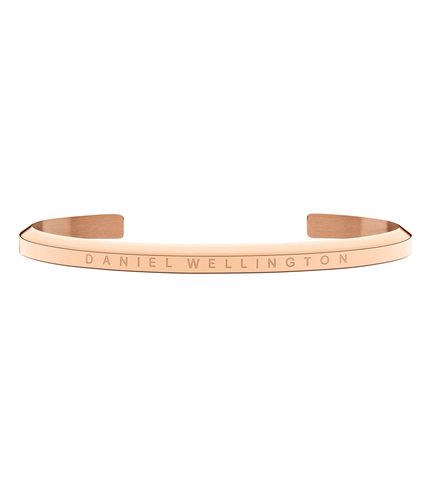 Elegant Daniel Wellington rose gold bracelet cuff, angled on a white backdrop, showcasing sleek minimalistic design and timeless charm.