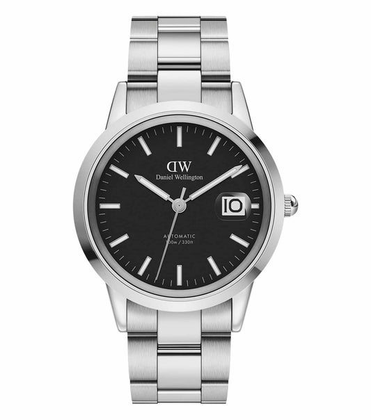 Daniel Wellington watch in blue, side angle view, showcasing iconic design with a sleek face and elegant strap, reflecting timeless style.