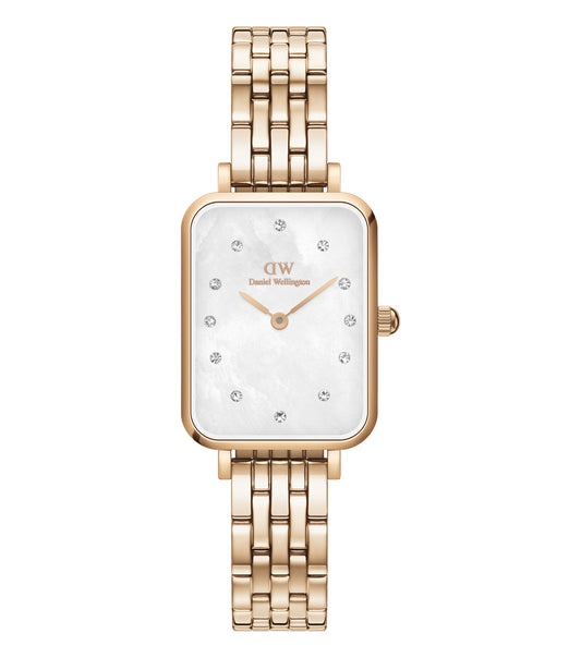 Daniel Wellington Quadro Lumine watch in gold, featuring an elegant square case, viewed at a slight angle showcasing its sleek minimalist design.