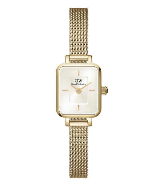 Elegant gold Daniel Wellington watch at a 45-degree angle, showcasing its minimalist design and smooth leather strap.