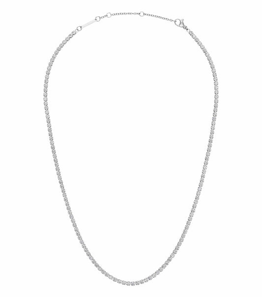Classic silver Daniel Wellington necklace showcasing an elegant tennis design, captured from a front angle, reflecting timeless style.