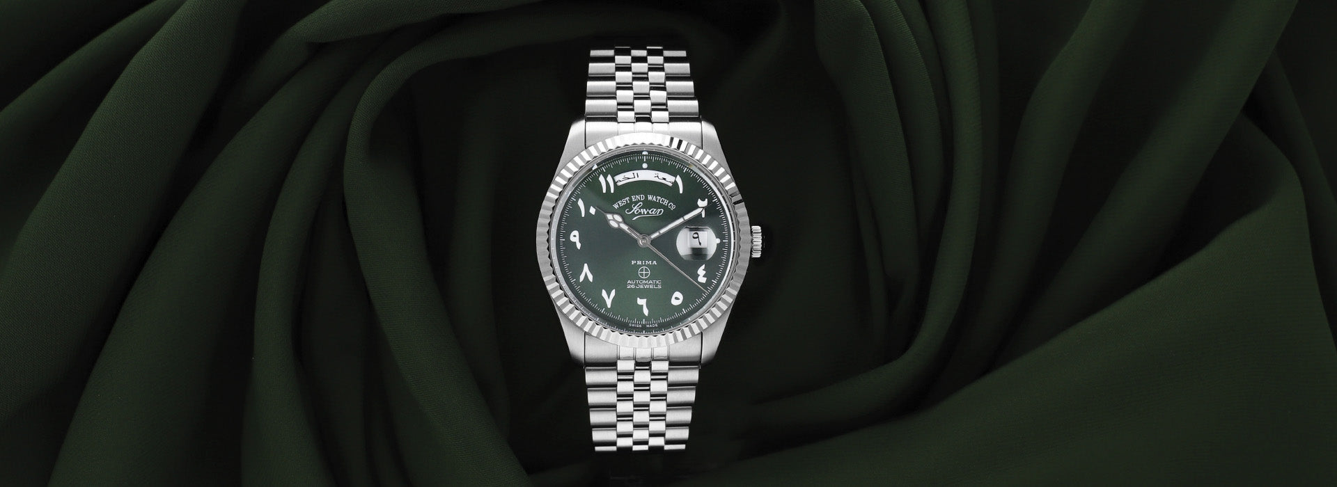 West End automatic watch featuring a green Arabic dial, stainless steel bracelet and classic Swiss watch design.