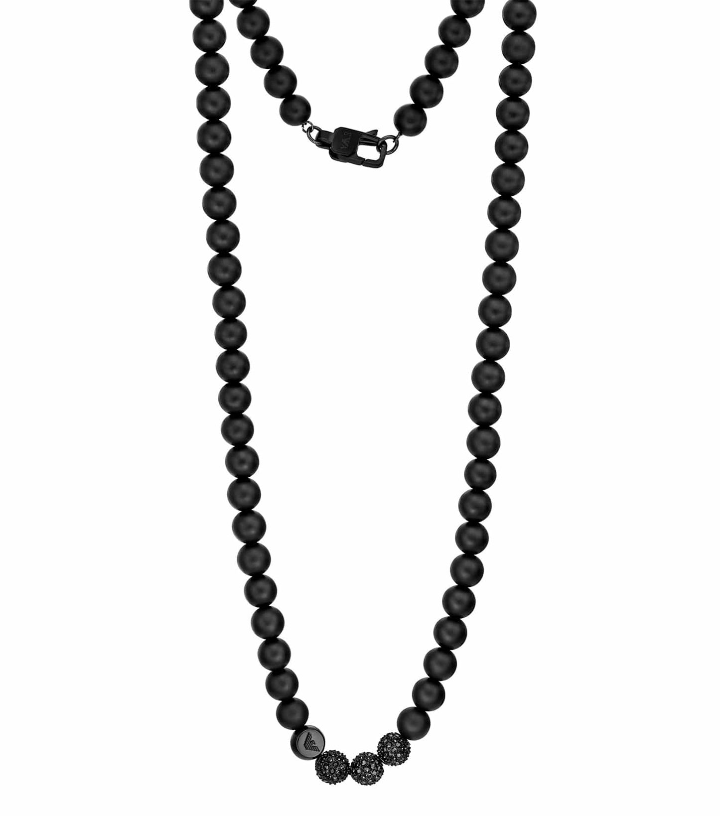Sleek black Emporio Armani Jewellery necklace shot from a top-down angle against a dark background, showcasing elegant chain details.
