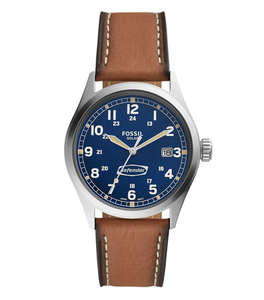Fossil solar watch in dark brown leather, silver case, blue dial; elegant side angle showcases classic design and detailed craftsmanship.