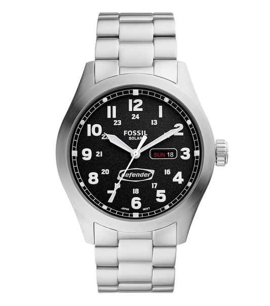 Fossil solar watch with golden hue and sleek silver stainless steel band, captured at an elegant 45-degree angle.