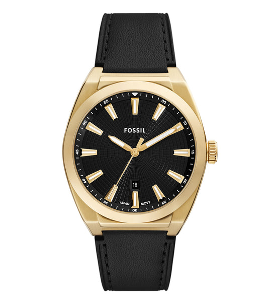 Fossil quartz watch with brown leather strap, black dial, and silver bezel, angled slightly to the left showcasing classic style.