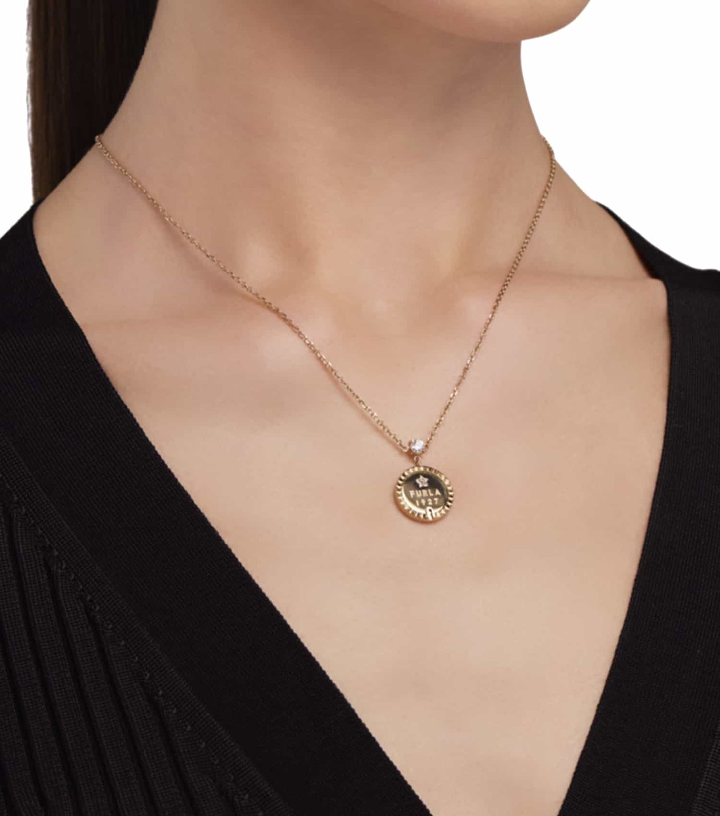 Furla gold necklace showcased at a front angle, vibrant gold color accentuating its elegant design and luxurious appeal.