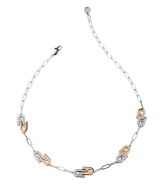 Furla silver and yellow gold-tone necklace displayed at an angle showcasing its intricate design and lustrous details.