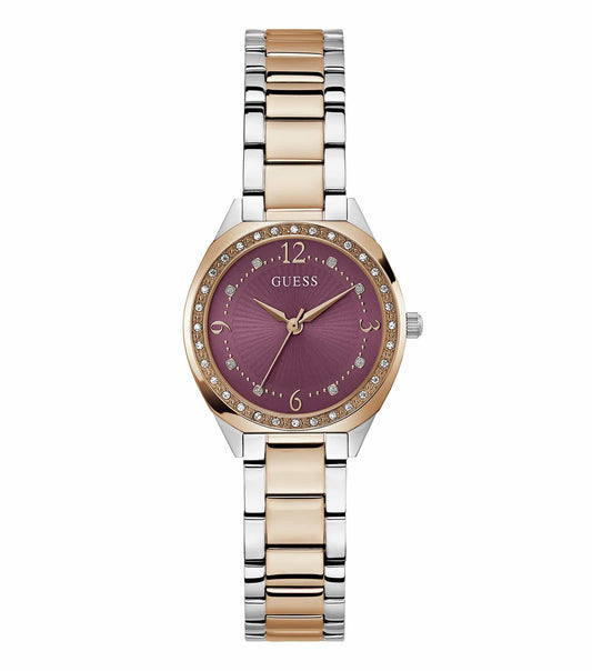 GUESS watch in a pale color, elegantly displayed at a 30-degree angle, showcasing its luxurious design and craftsmanship.