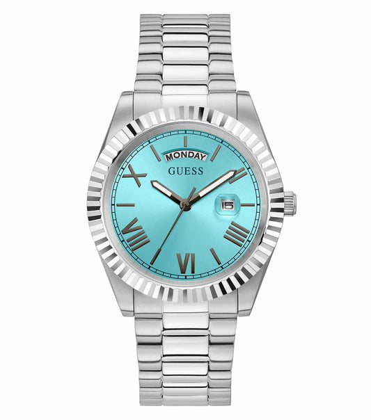 Guess quartz watch in blue, featuring a sleek round face and silver accents, displayed at a dynamic angle.