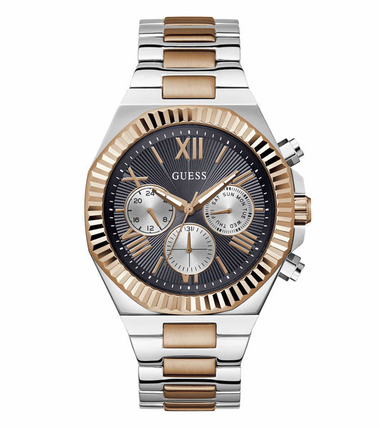 Guess watch with brown leather strap and silver-tone bezel, angled to showcase its elegant design, with a polished case.