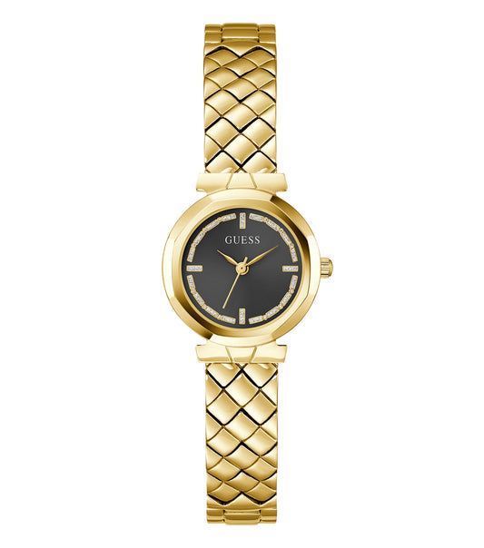 Guess gold-tone watch with a sparkling crystal-studded bezel, photographed at a slight angle, showcasing its elegant design.