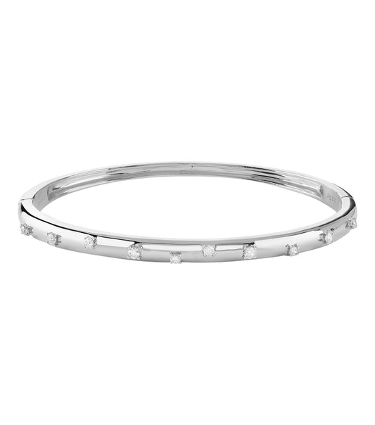 Sleek silver Guess Jewellery bracelet featuring a minimalist design, displayed at a front angle against a white backdrop.