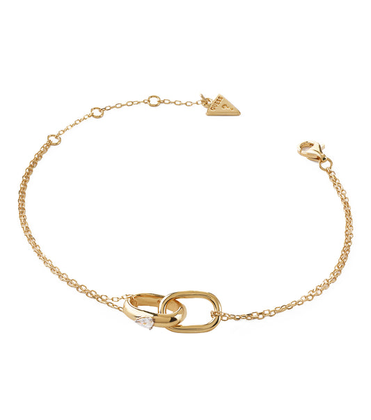 Gold Guess Jewellery bracelet showcased at a three-quarter angle, exuding elegance with its shiny metallic finish and sleek design.
