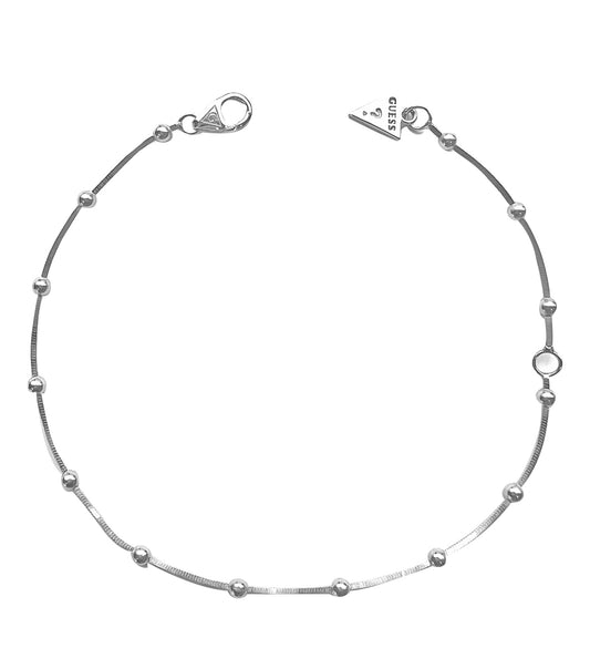 Guess Jewellery silver bracelet with heart and crystal accents, showcasing an elegant side angle for timeless style.