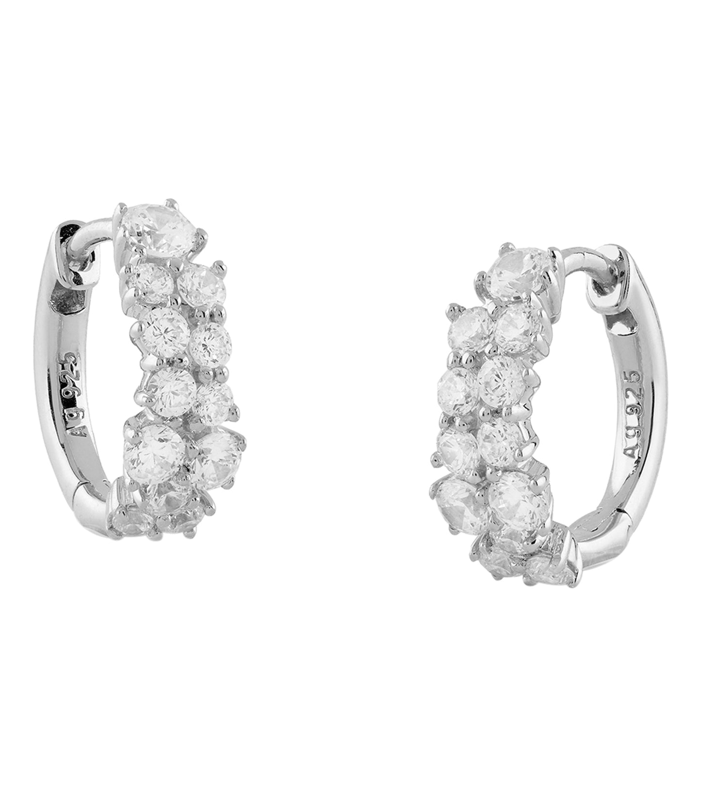Silver Guess Jewellery earrings, angled at 45 degrees, showcasing a sleek design and shiny silver finish in an elegant close-up.