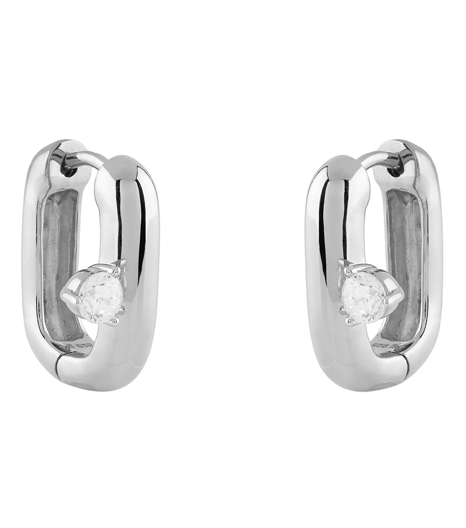 Elegant Guess Jewellery silver earrings, close-up angled view, shimmering curves and intricate design showcasing refined craftsmanship.
