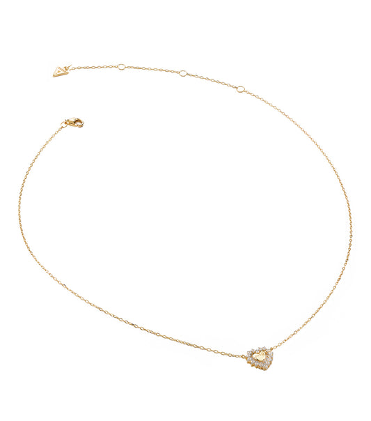 Stunning gold-colored Guess Jewellery necklace, showcasing intricate design, captured at a slight left-angle.
