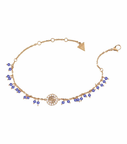 Elegant gold-tone anklet by Guess Jewellery in a close-up side angle, showcasing its sleek design and premium finish.