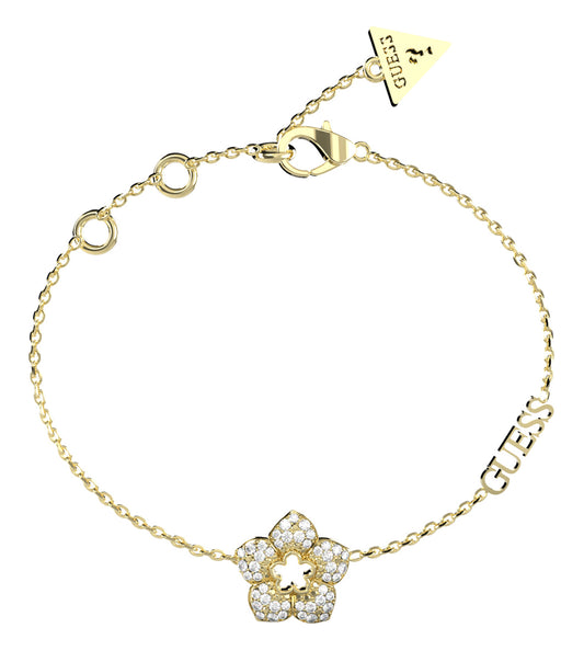 Gold Guess Jewellery bracelet with a subtle shine, elegantly showcased at a 45-degree angle, highlighting its luxurious simplicity.