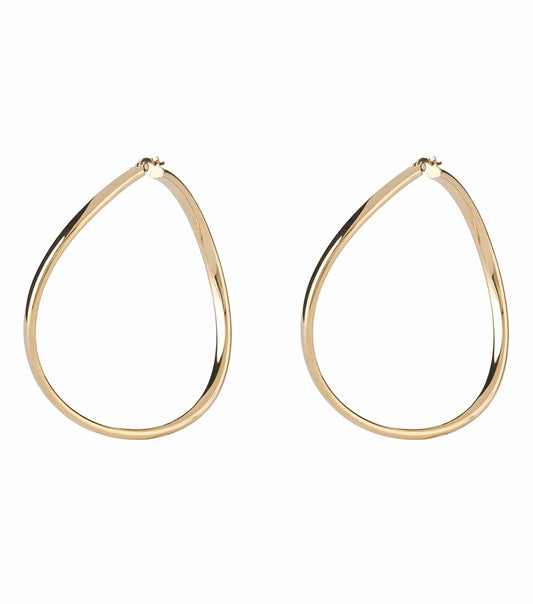 Guess Jewellery gold earrings showcasing a sleek, captivating design; frontal angle highlights their elegance and shine.