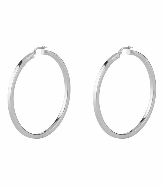 Gold-colored Guess Jewellery earrings displayed from a high angle, showcasing elegant design and craftsmanship with subtle reflections.