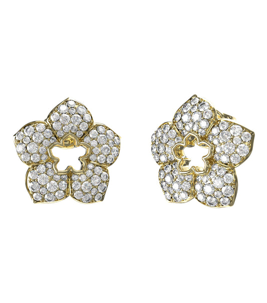 Guess Jewellery gold earrings with intricate texture, showcasing a front-facing angle, capturing elegance and style in every detail.