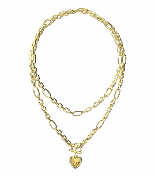 Guess Jewellery gold necklace, close-up showcasing elegant chain with bold Guess pendant, vibrant design, front-facing angle.