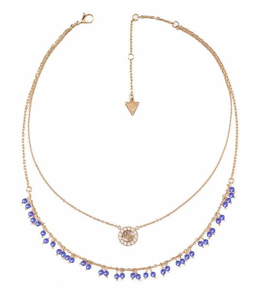 Gold-colored Guess Jewellery necklace, elegantly displayed lying flat in striking detail, showcasing exquisite craftsmanship.