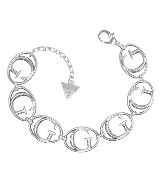 Elegant Guess Jewellery silver bracelet on a stylish mannequin at eye-level, showcasing intricate chain design and gleaming finish.