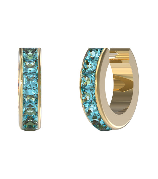 Gold colored Guess Jewellery earrings displayed front-facing against a white background, showcasing their elegant design.