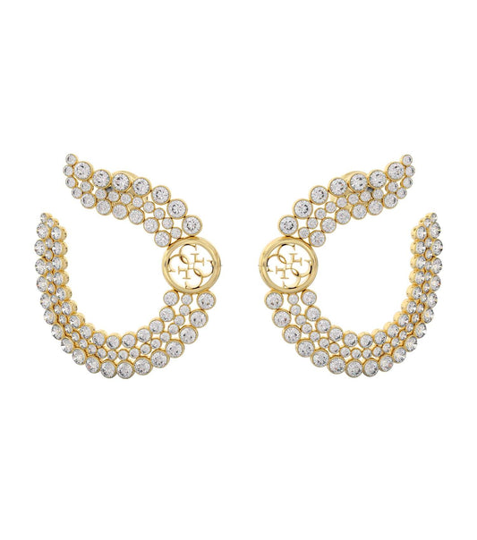 Gold Guess Jewellery earrings, bold design, showcased at a dynamic angle; shimmering allure perfect for fashion-forward enthusiasts.