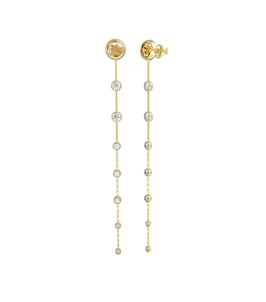 Gold-tone earrings by Guess Jewellery, captured at a slight angle, showcasing their elegant design and high-quality finish.