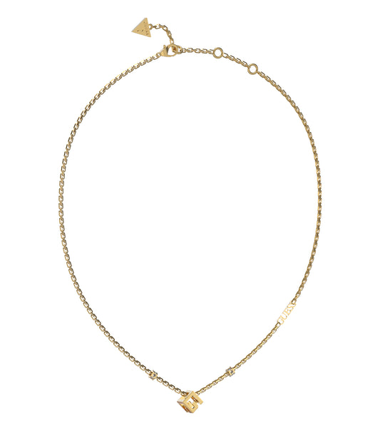 Gold Guess Jewellery necklace with intricate chain design, elegantly showcased at a dynamic angle against a soft focus background.