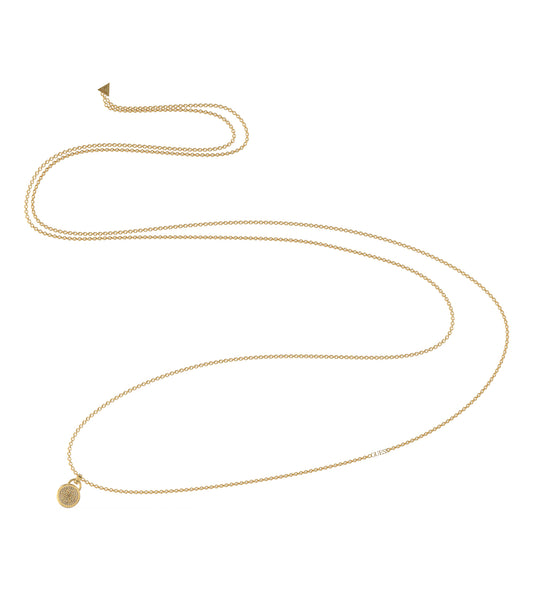 Guess Jewellery gold necklace, vibrant and elegant, showcasing a close-up oblique angle with delicate chain details.