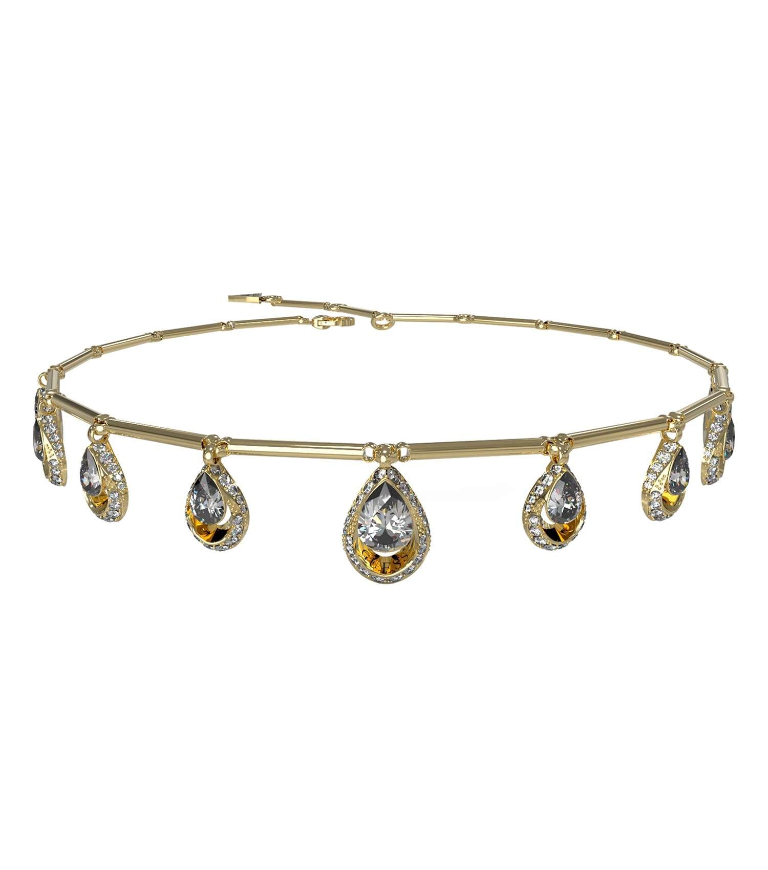 GUESS Jewellery gold necklace, photographed at a diagonal angle, showcasing its elegant design and shimmering finish.