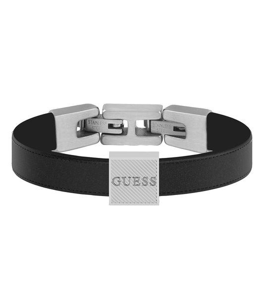 Silver GUESS Jewellery bracelet with signature embossed detail, beautifully captured in a soft close-up angle.