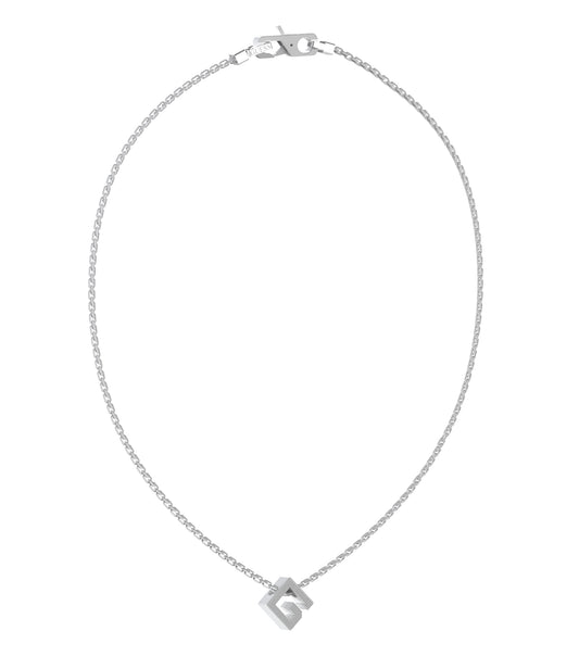 Silver Guess Jewellery necklace elegantly displayed at a slight angle against a clean white backdrop, showcasing its refined design.