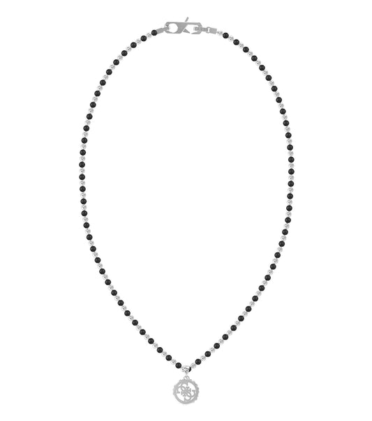 Elegant Guess Jewellery necklace in silver with gold accents, displayed at an alluring front angle against a white background.