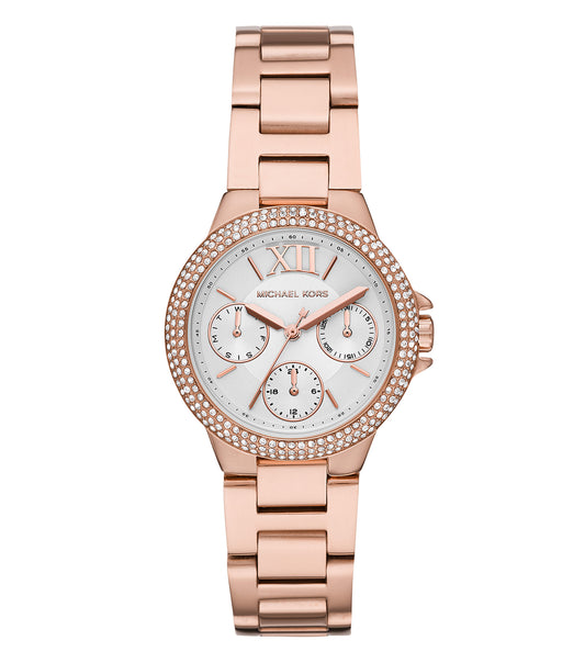 Michael Kors watch in silver, featuring a classic round dial, captured at a three-quarter angle, showcasing elegance and precision.